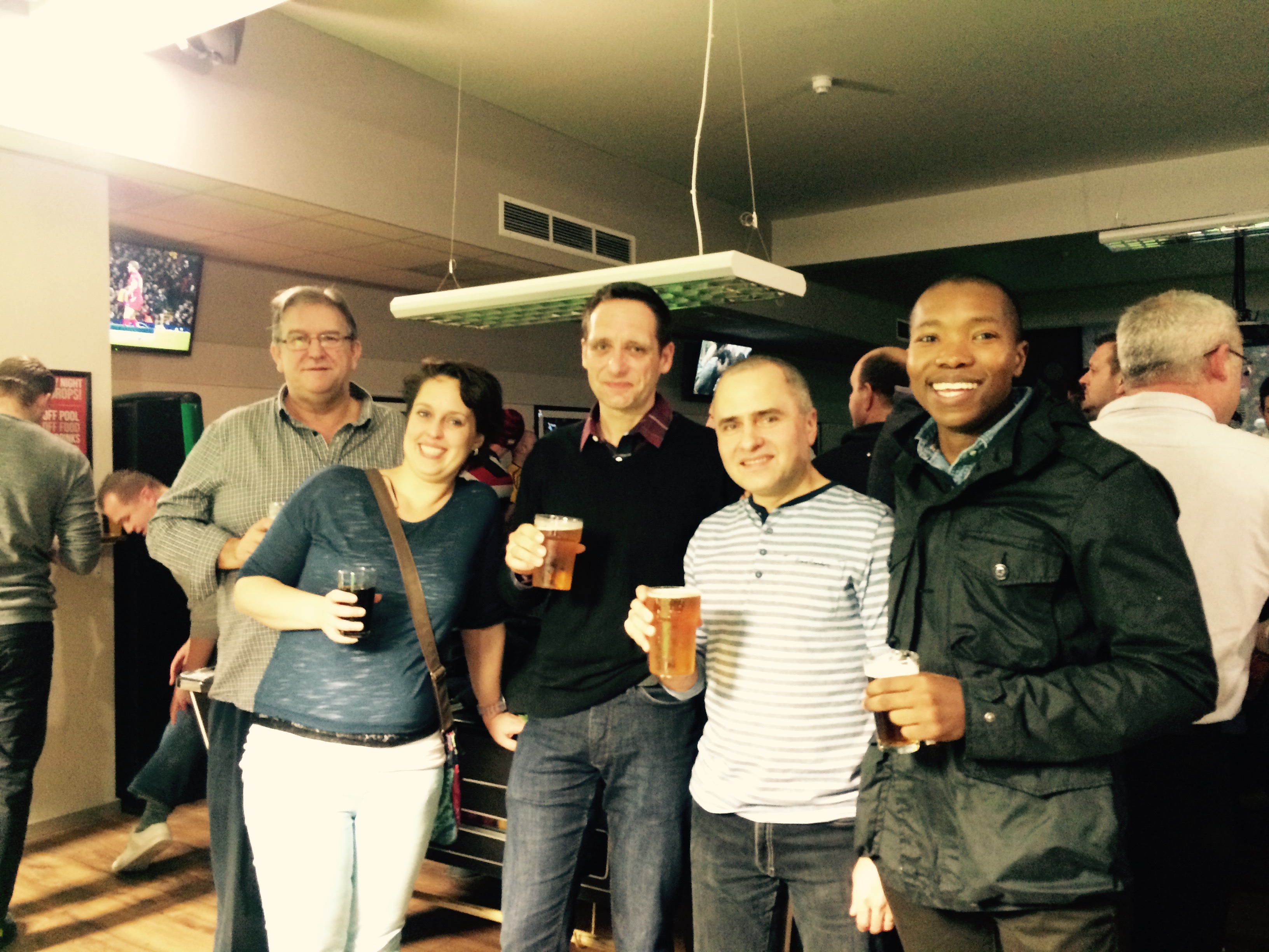 Mike, Course Instructor, and a few of the delegates enjoying a casual drink together